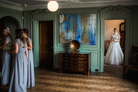 Bride walking out of bridal prep