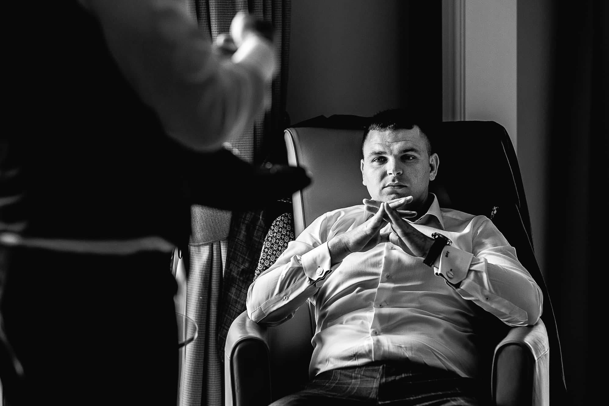 Groom waiting nervously 