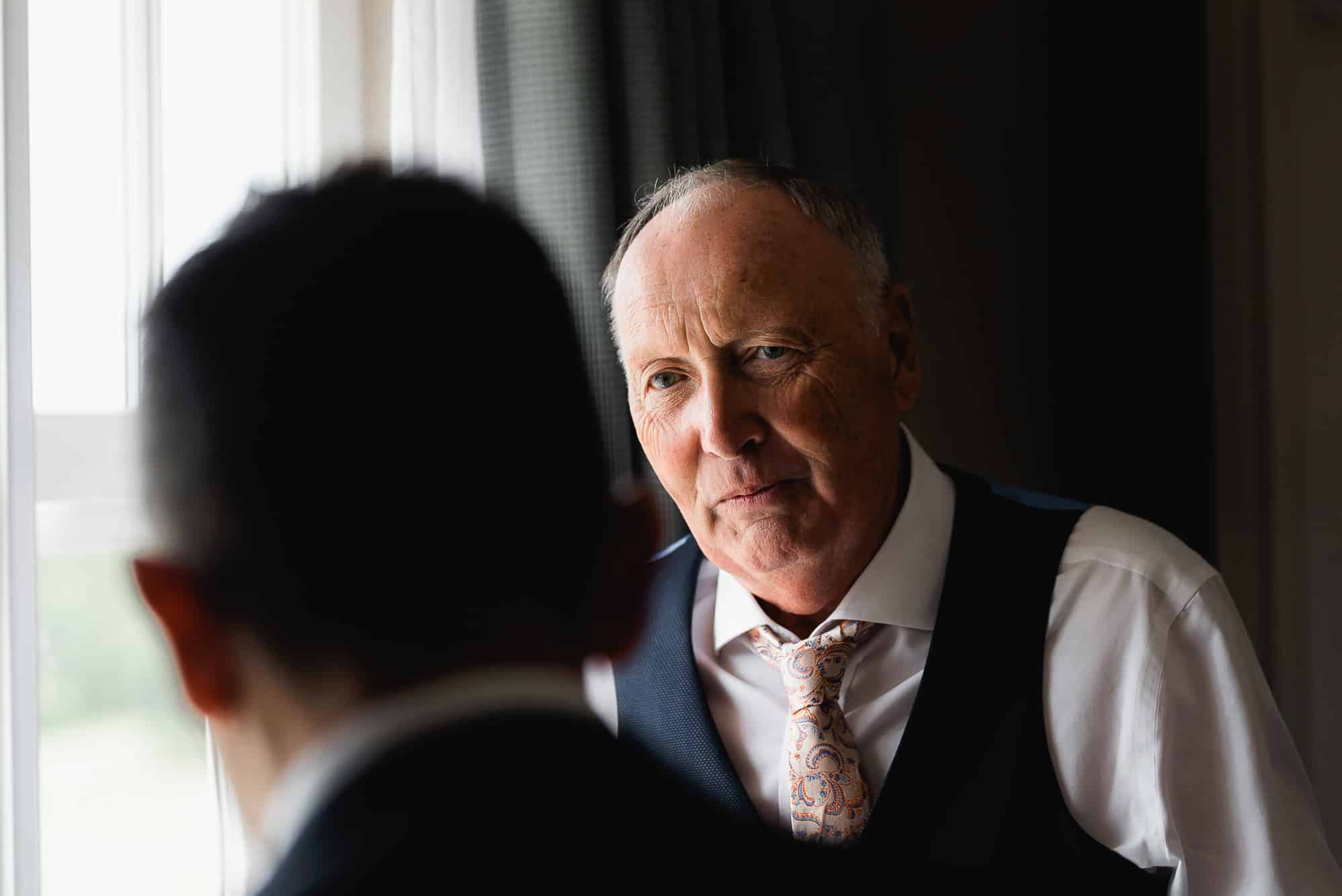 Grandad talking to grandson