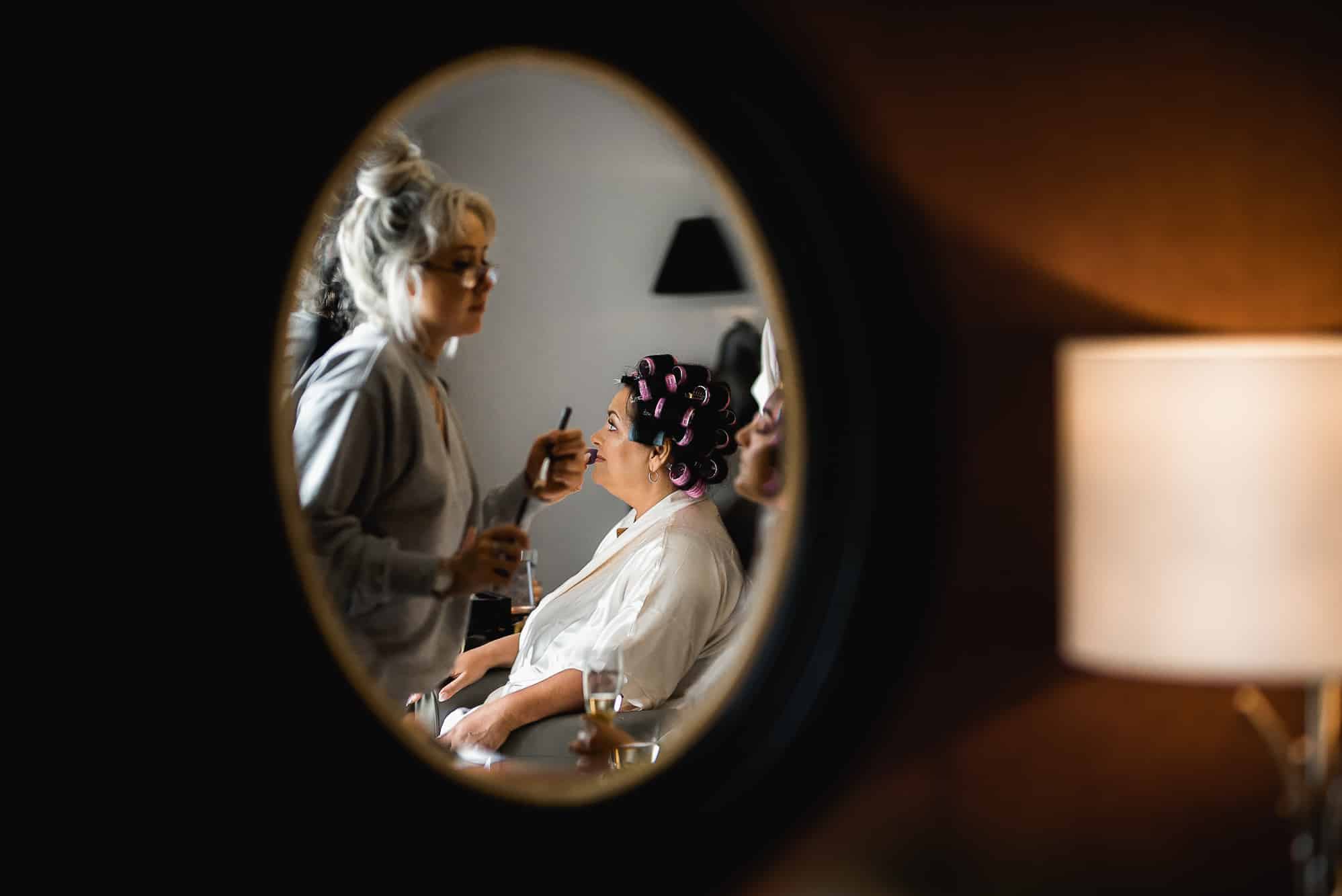 Mother of groom getting ready