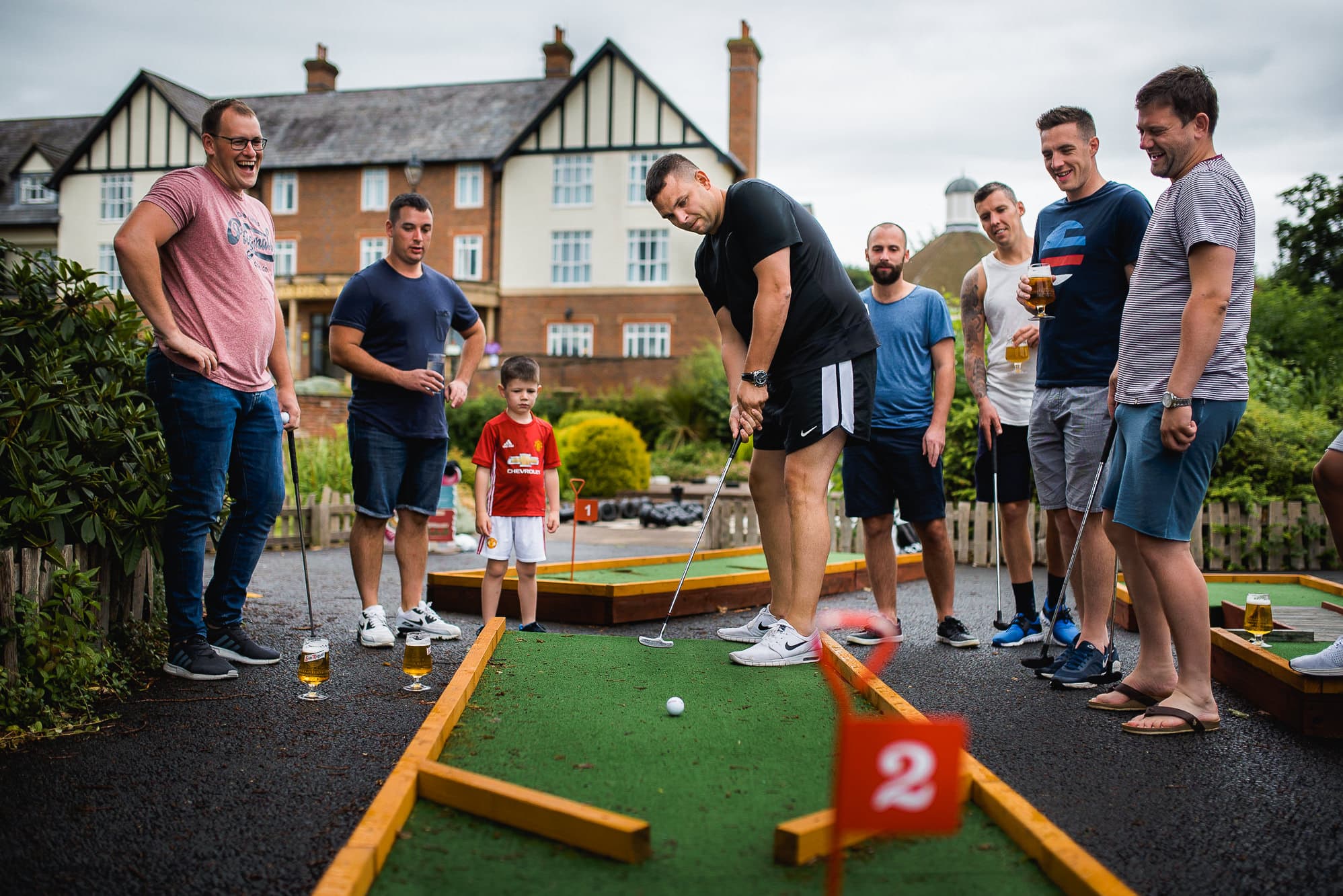 Groom playing crazy golf
