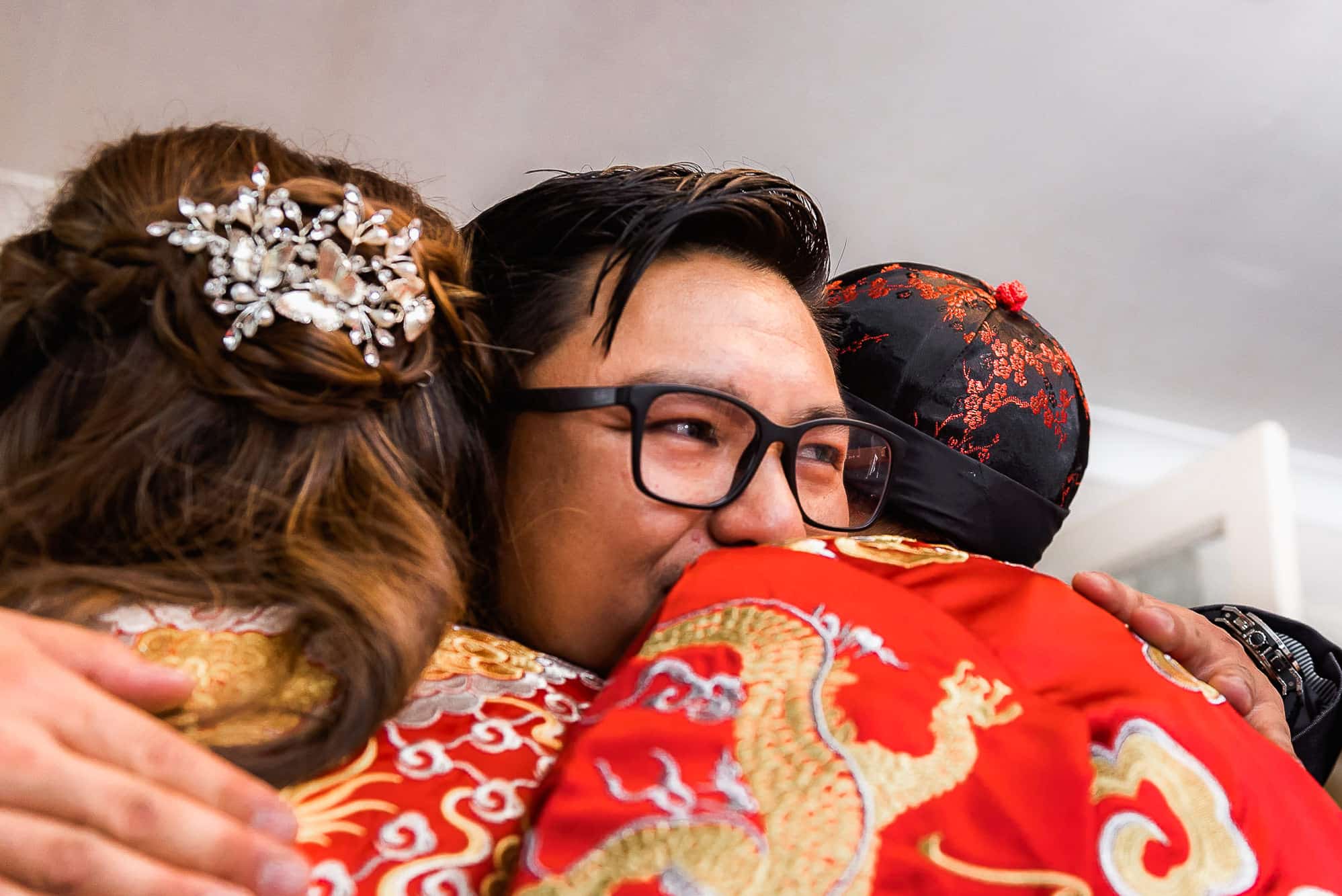 Chinese Wedding Photography | Manchester | Ray & Julie 23 hugs with groom and bride and groom