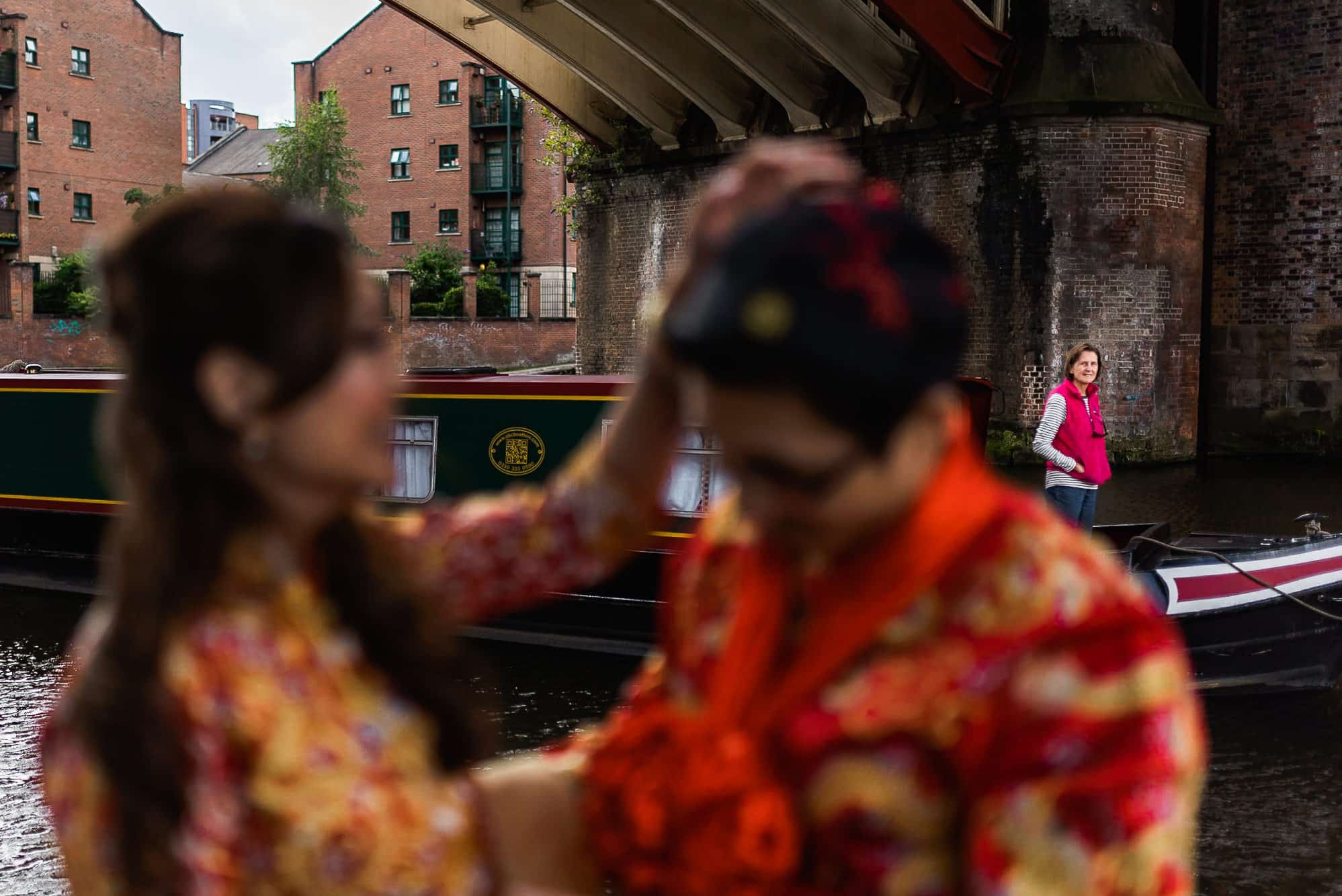 Chinese Wedding Photography | Manchester | Ray & Julie 27 Canal boat going past bride and groom