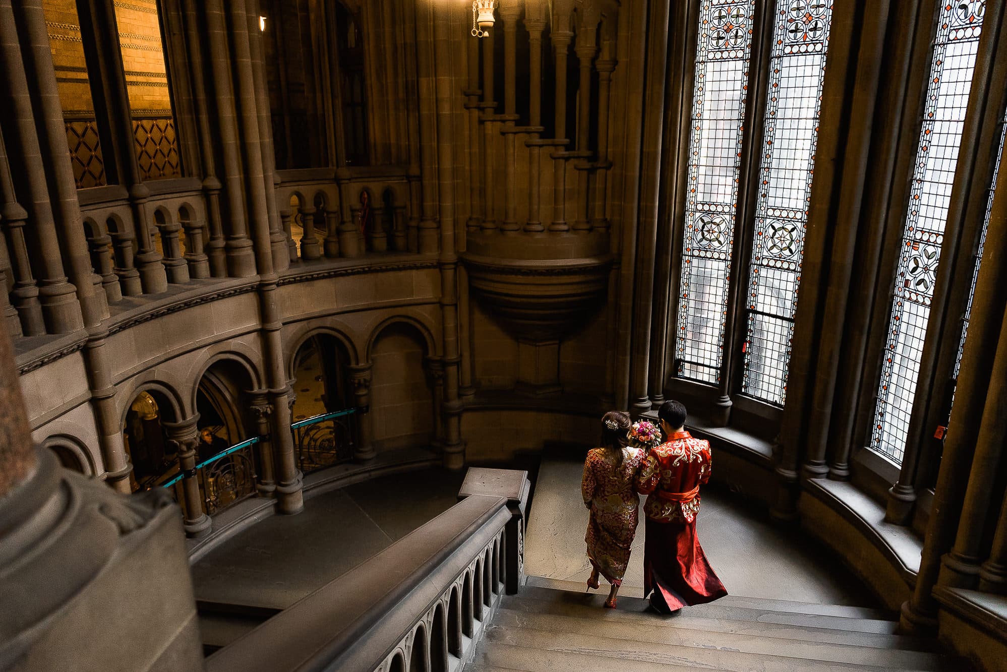 Chinese Wedding Photography | Manchester | Ray & Julie 29 Walking down stairs at Manchester Town Hall