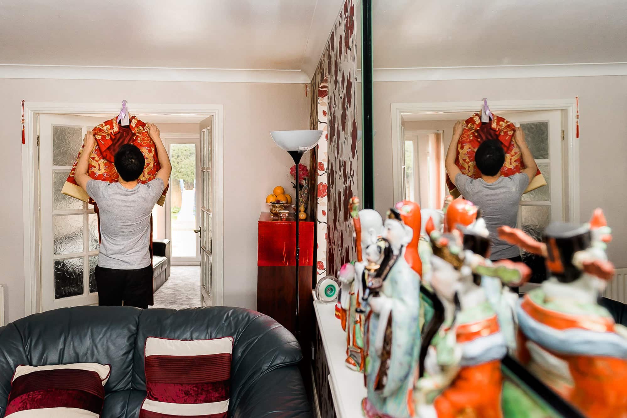 Chinese Wedding Photography | Manchester | Ray & Julie 2 Groom putting on his suit