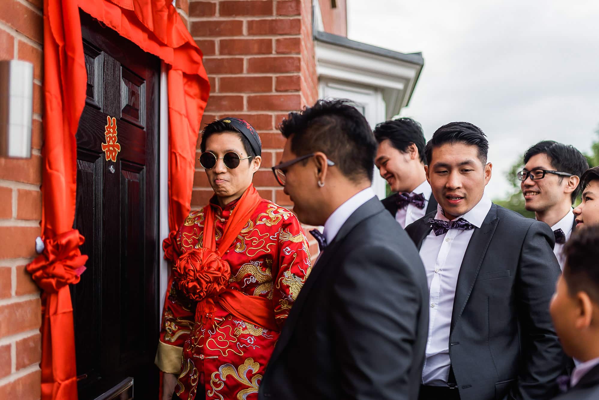Chinese Wedding Photography | Manchester | Ray & Julie 4 Groom waiting at the door with groomsmen