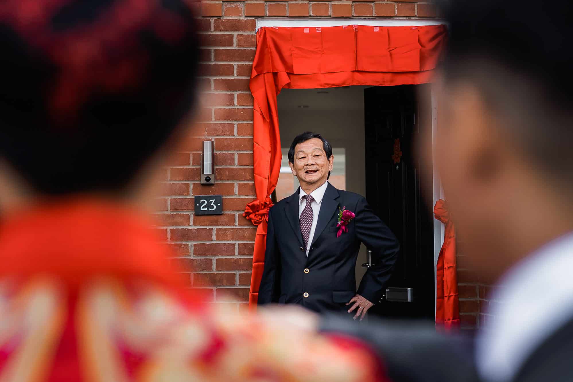 Chinese Wedding Photography | Manchester | Ray & Julie 5 Groom looking on to brides father