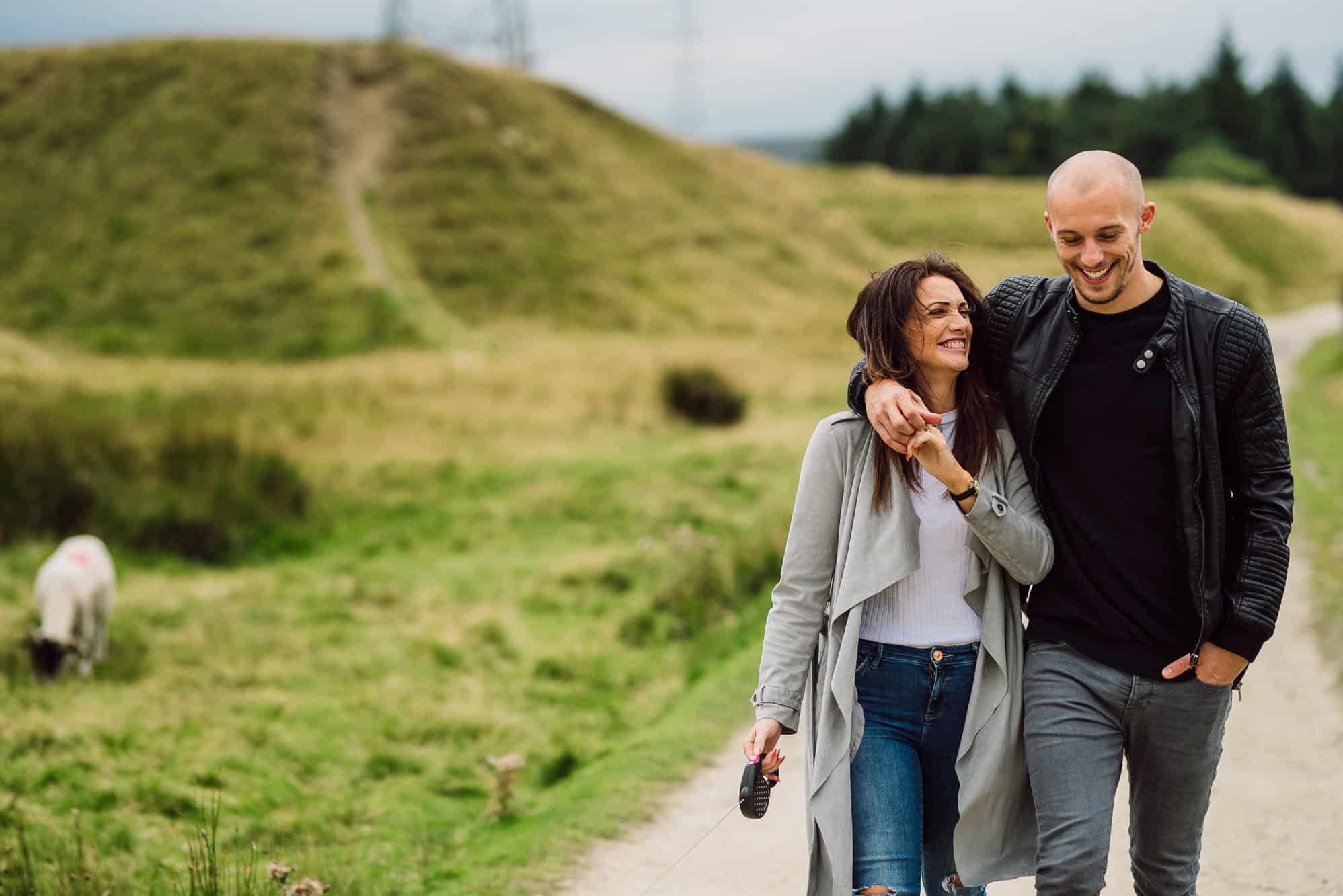 Couple cuddling and laughing