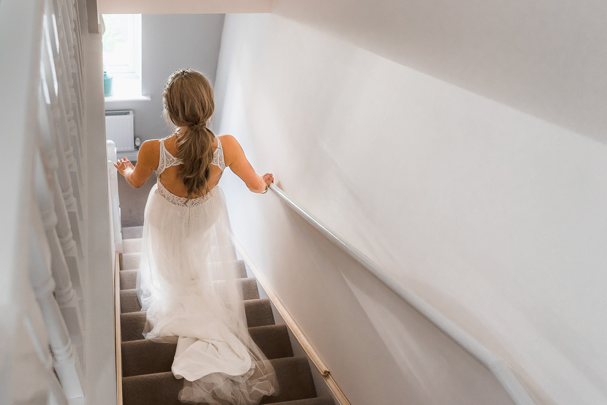 bride walking down stairs