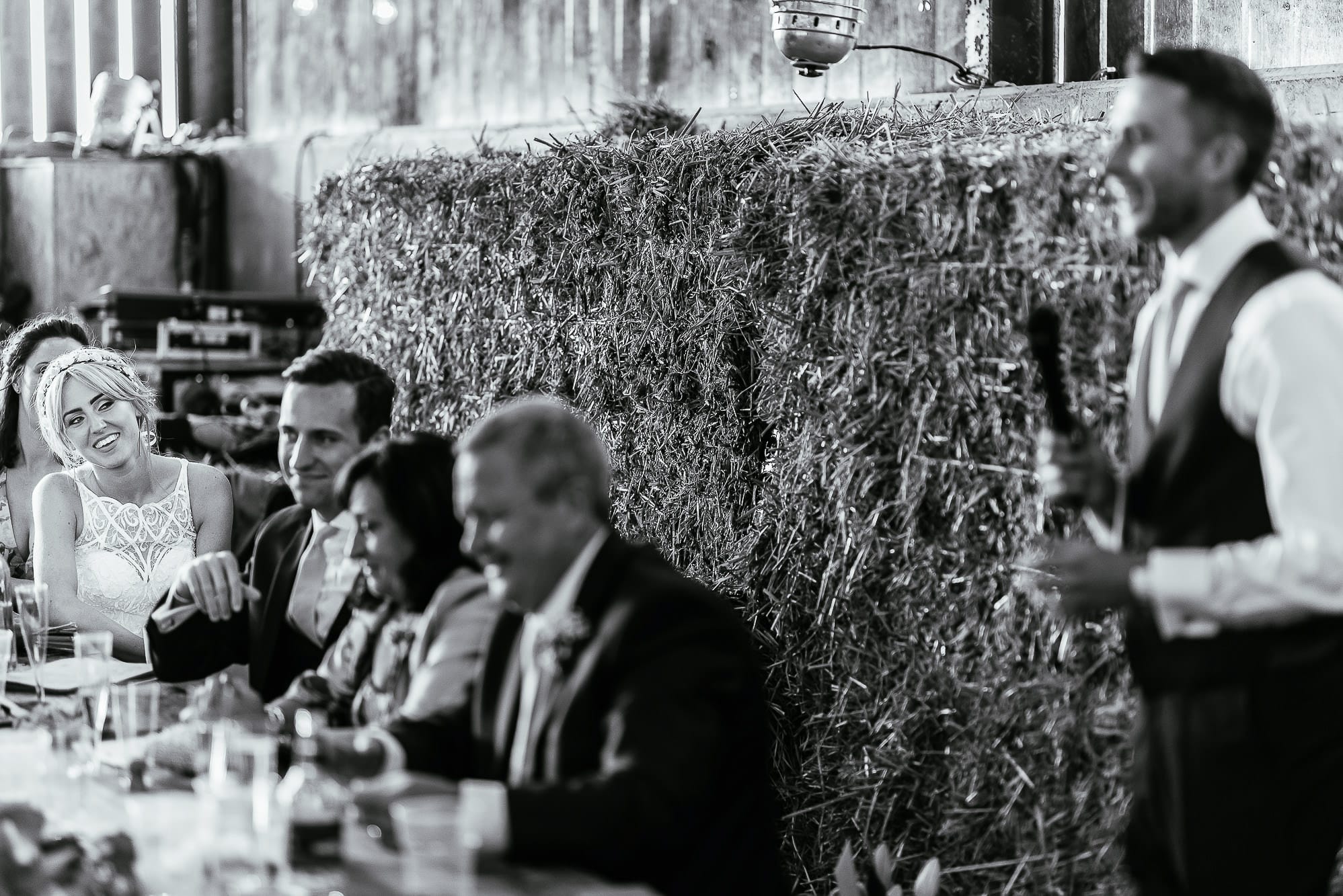 Groom speech with bride looking