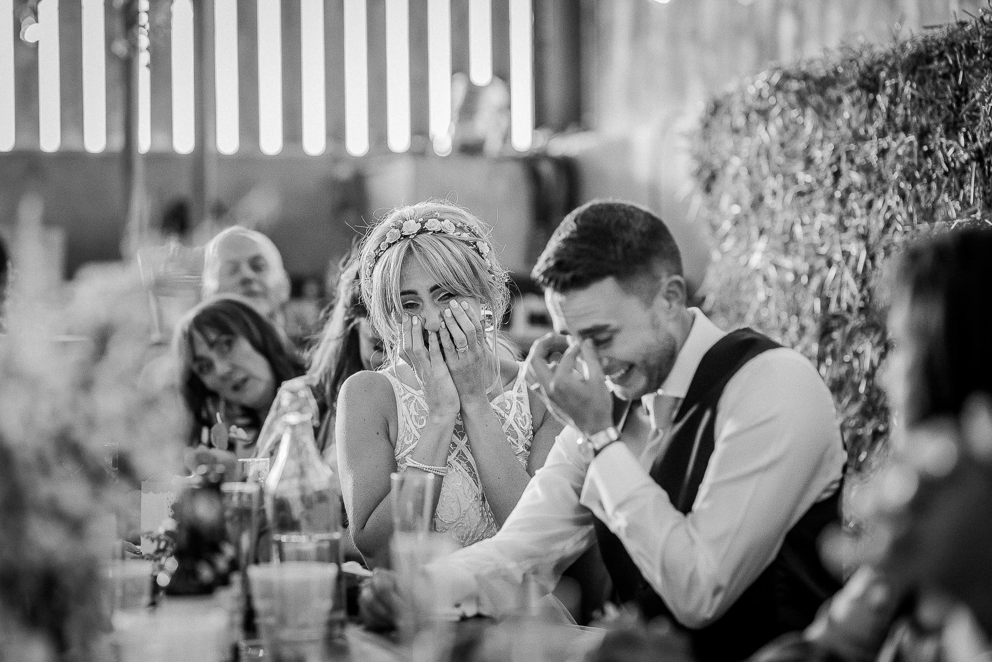 Couple with head in hands