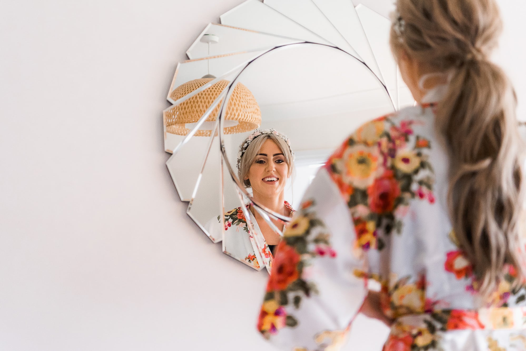 bride looking in mirror