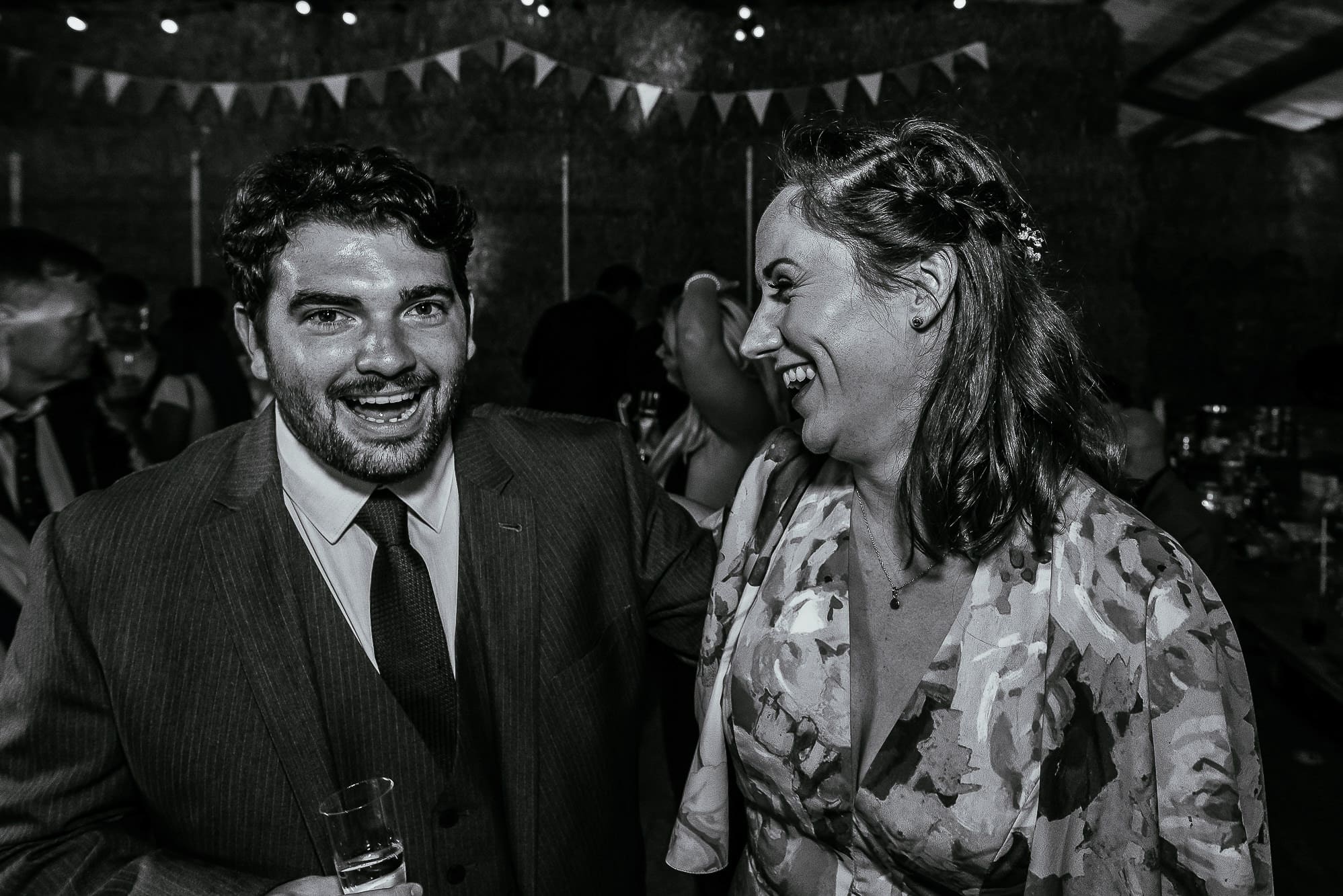 Guests laughing on dance floor