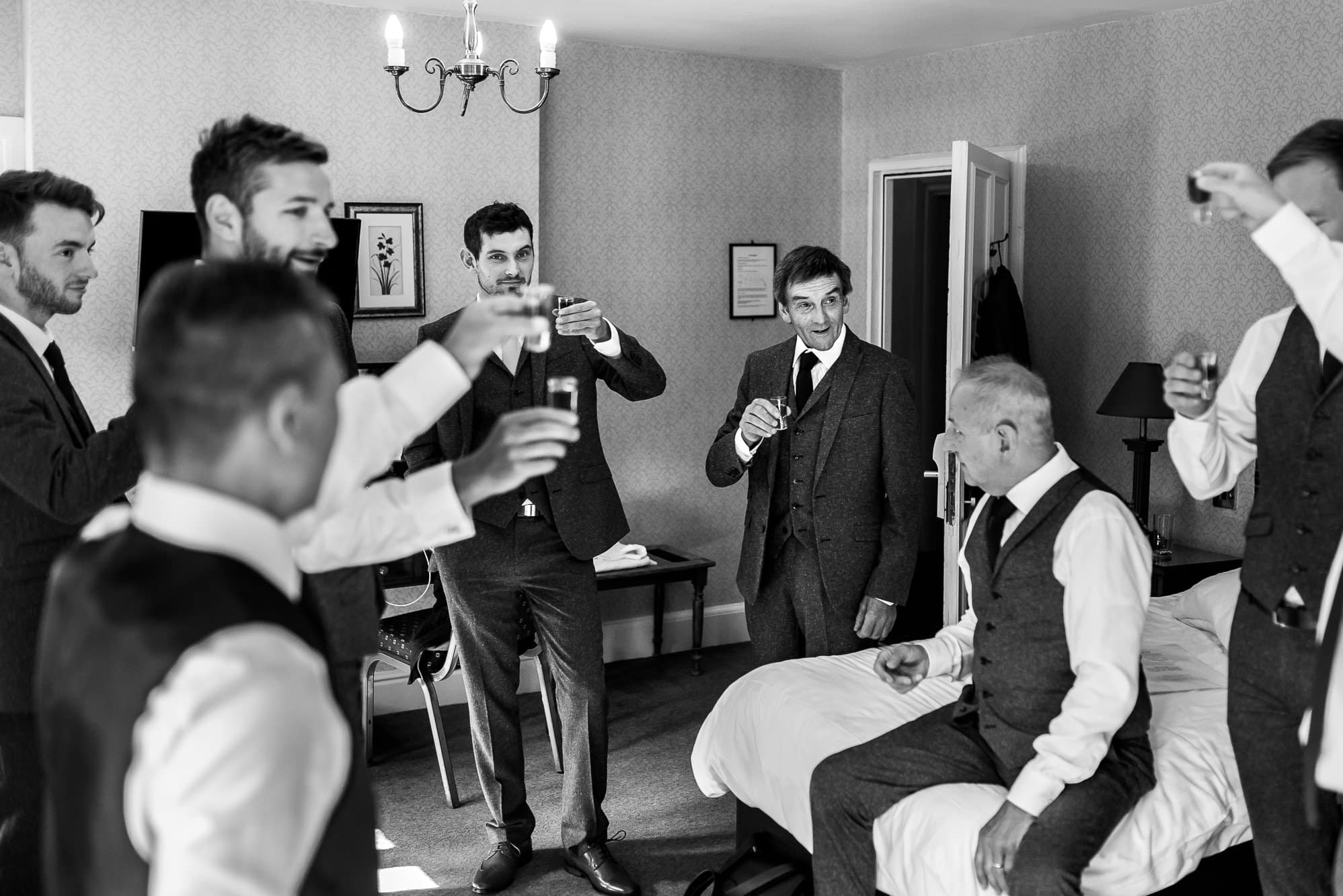 Groomsmen having a shot