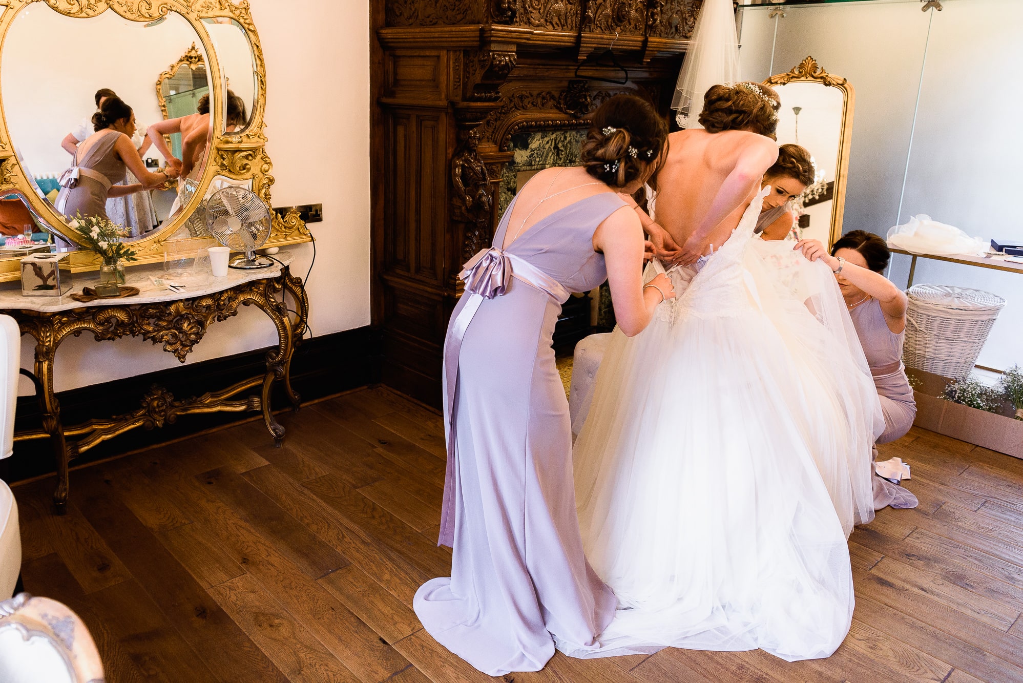Tyn Dwr Hall Wedding Photography | Andy Griffiths Photography 11 Getting into the dress at Tyn Dwr Hall