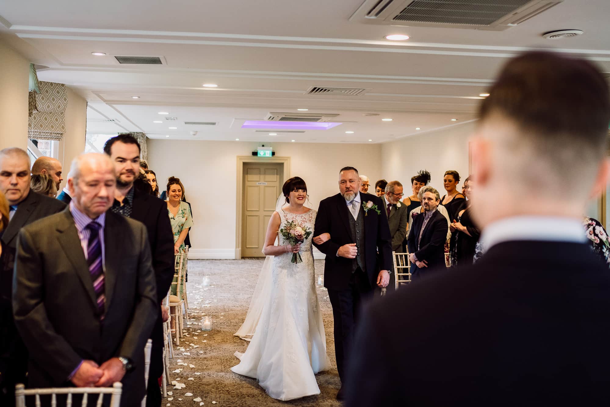 Crabwall Manor Wedding Photography | Mark & Beth 10 The bride walks down the aisle to get married