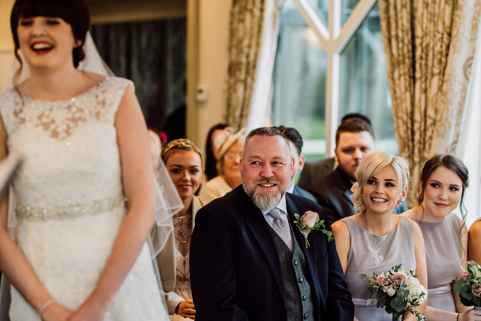 Crabwall Manor Wedding Photography | Mark & Beth 12 Father of the bride looks on