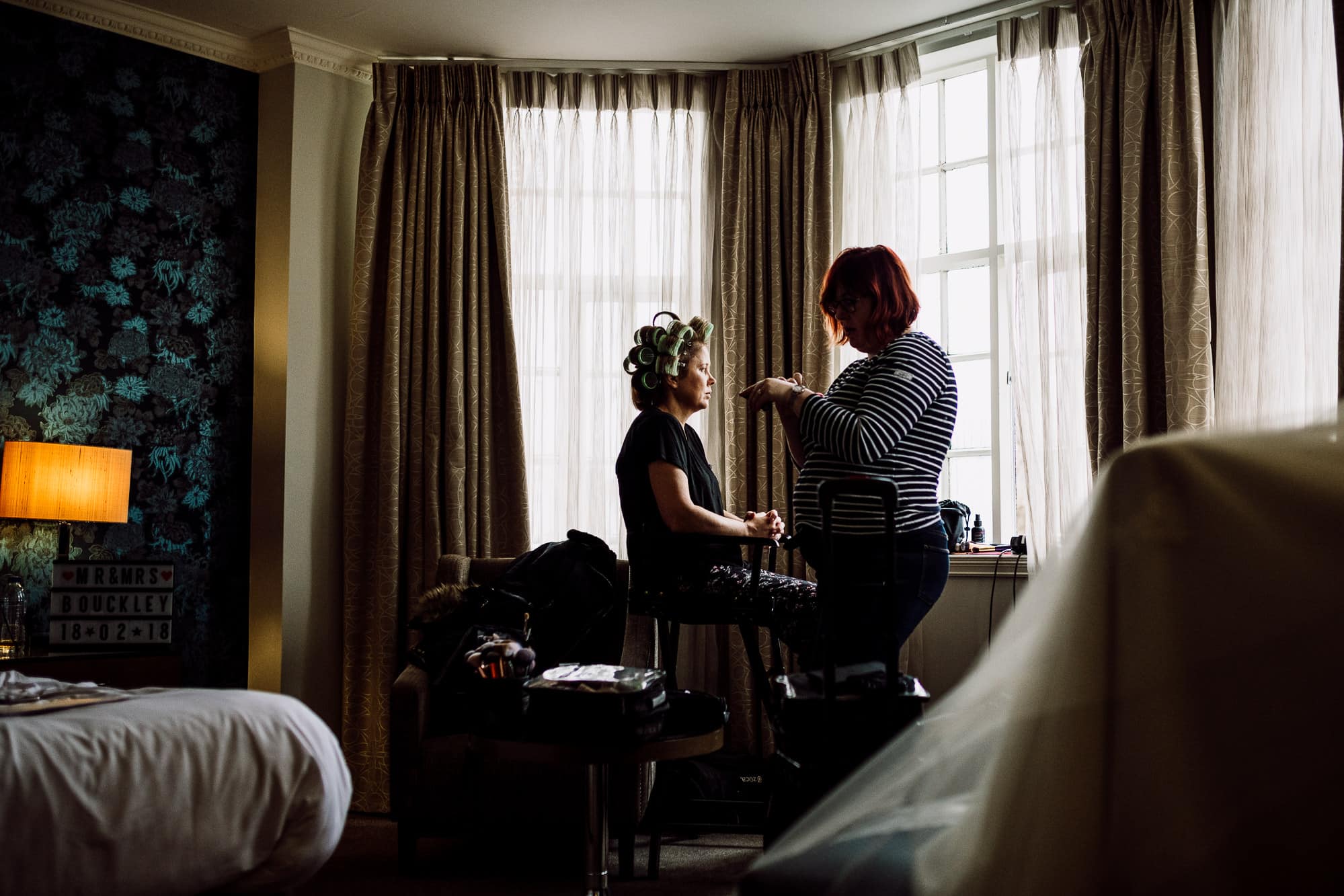 Crabwall Manor Wedding Photography | Mark & Beth 3 The mother of the bride having her make up done in the bridal suite
