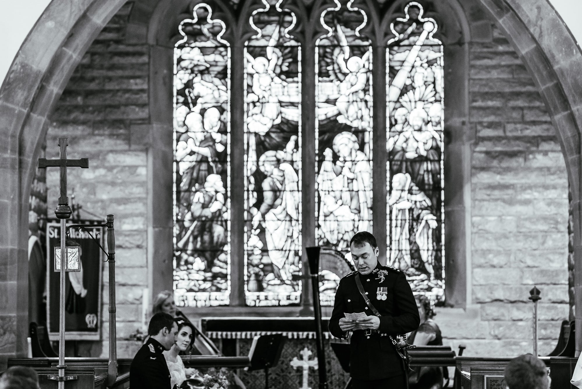 An usher makes a speech during service