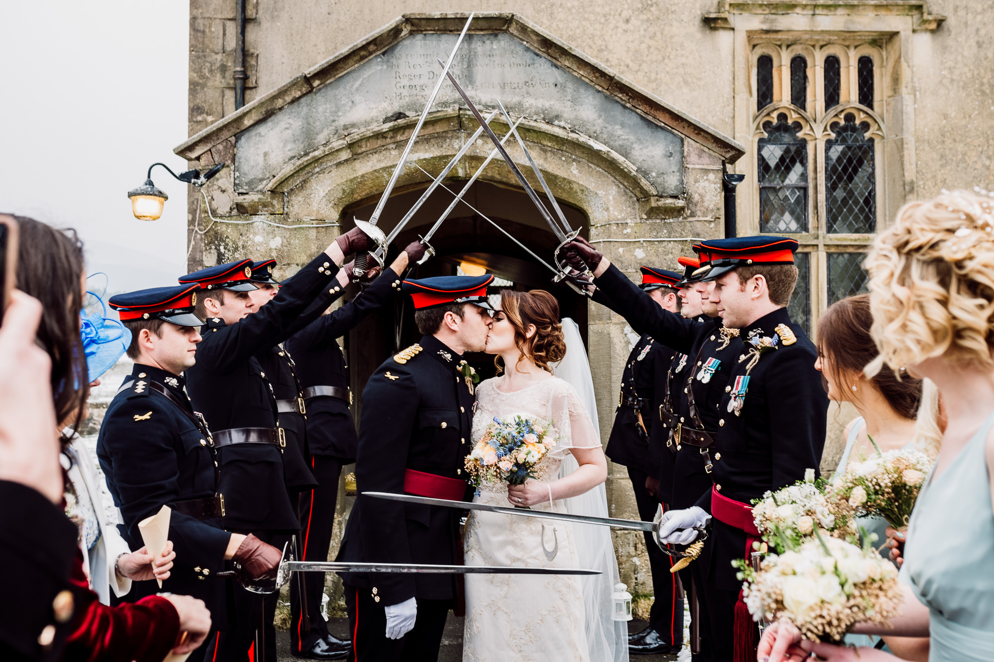 A kiss with members of the army and their swords