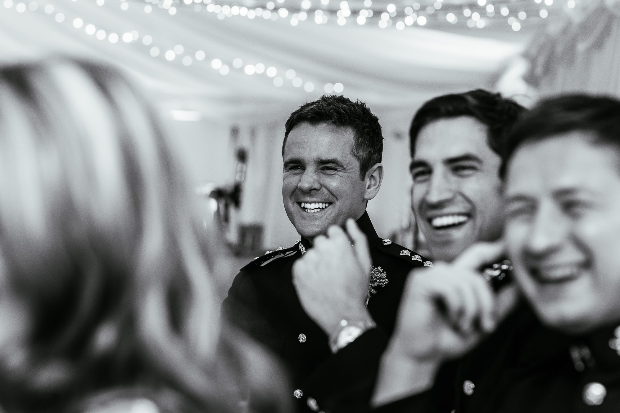 Guests laughing during speeches