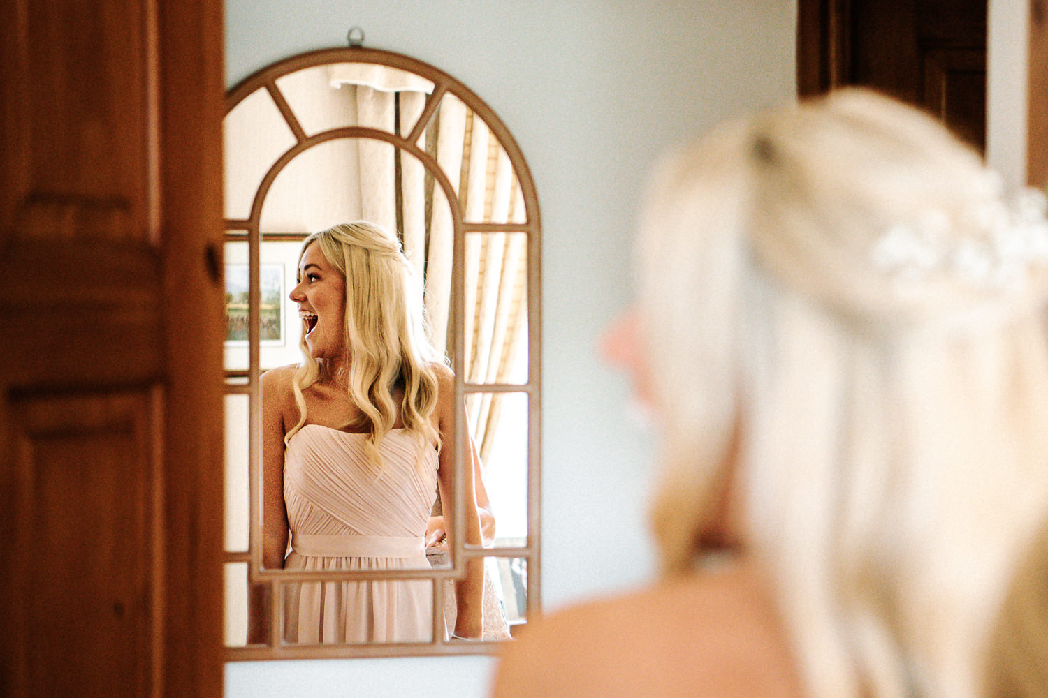 bridesmaid looking in the mirror