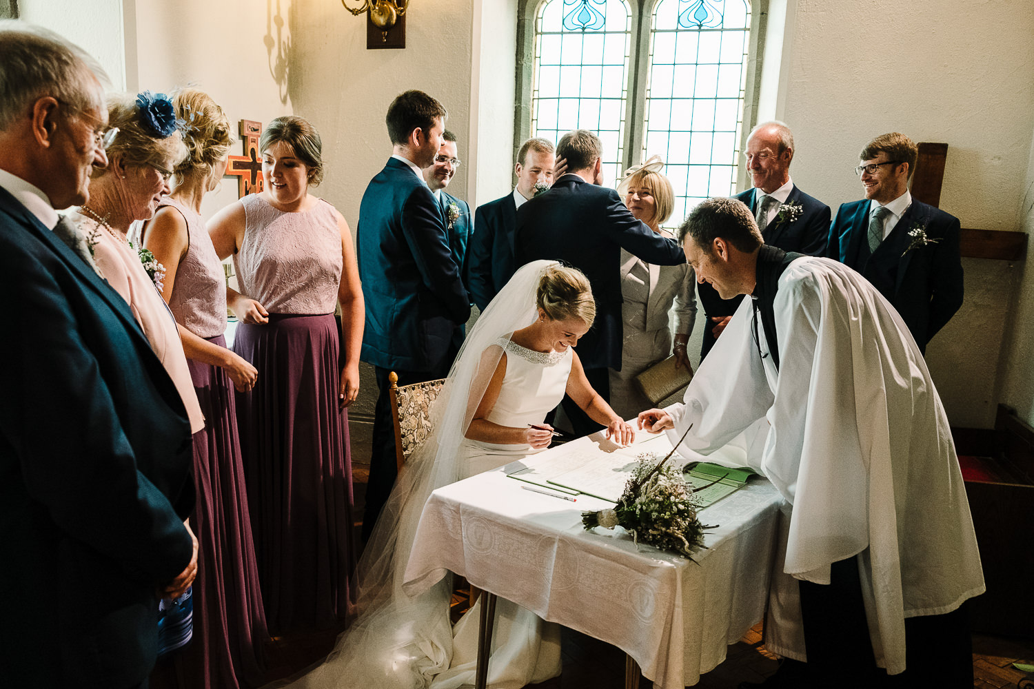 Bride signing the register