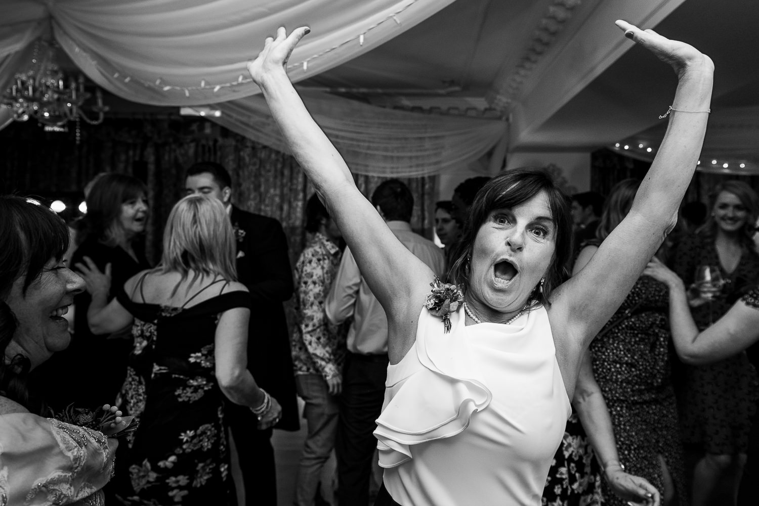 wedding guest dancing at Eaves Hall