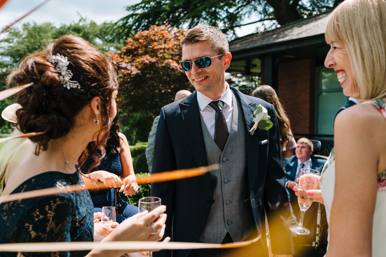Guests drinking and laughing