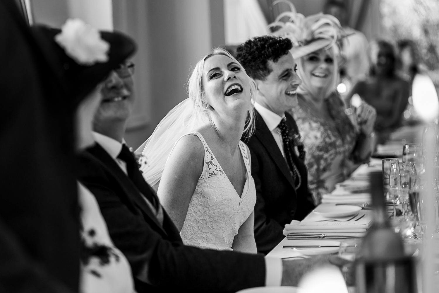 bride laughing during speech