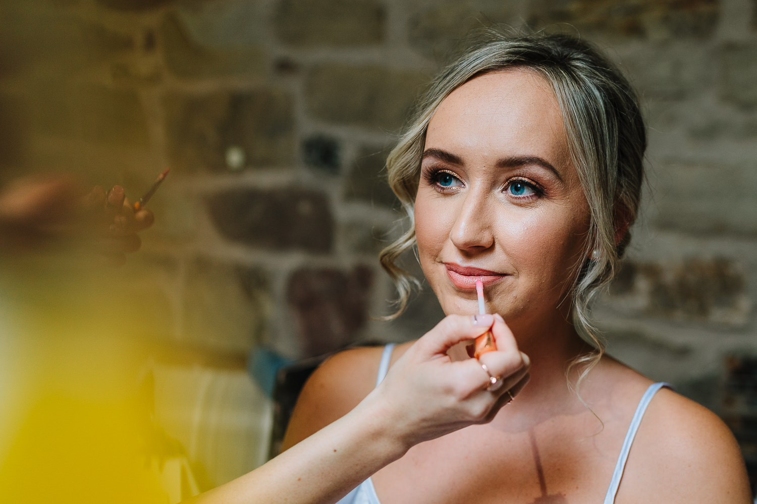 Bride having make up done at Beeston Manor