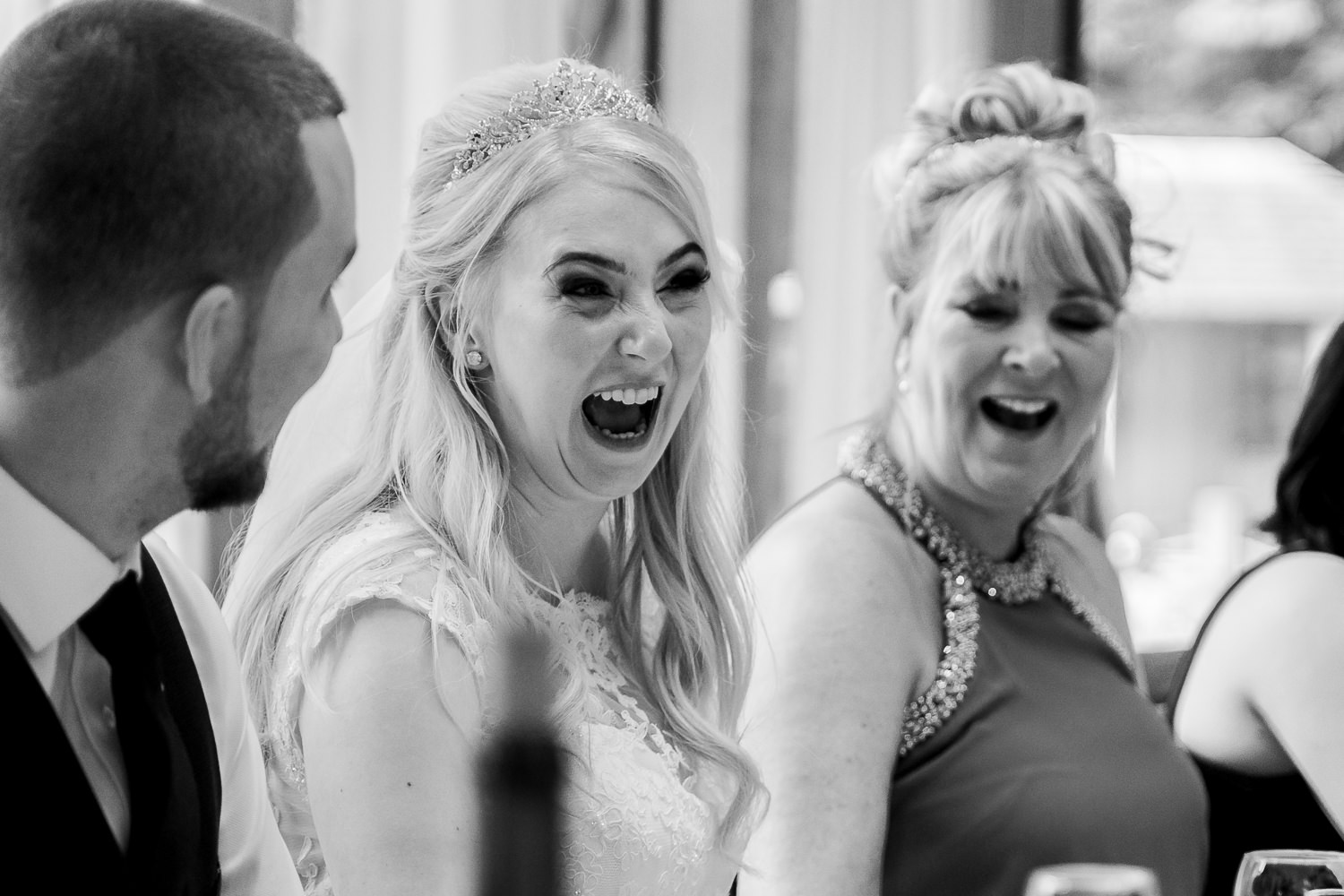 bride and her mum laughing