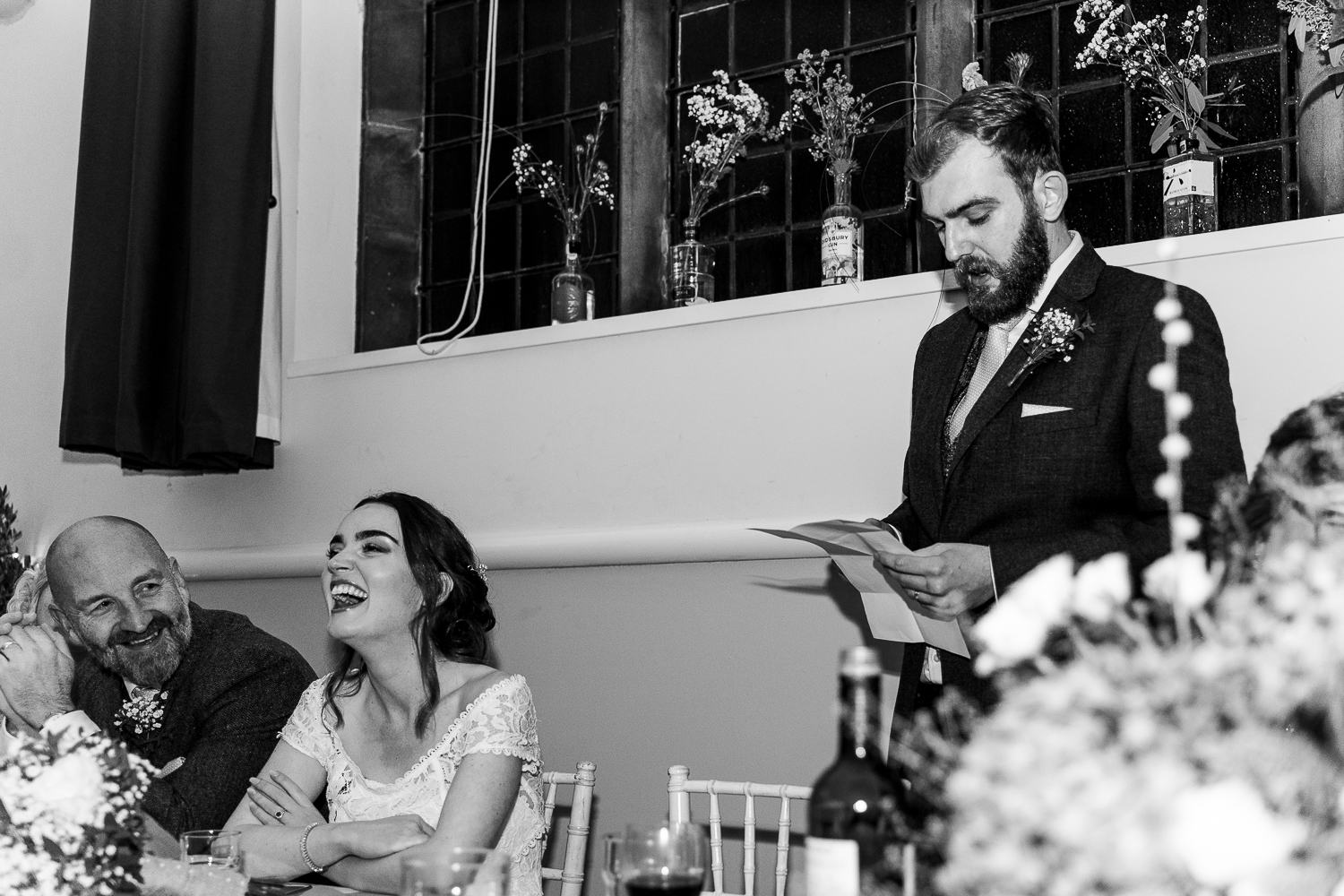 Groom speech and bride laughing