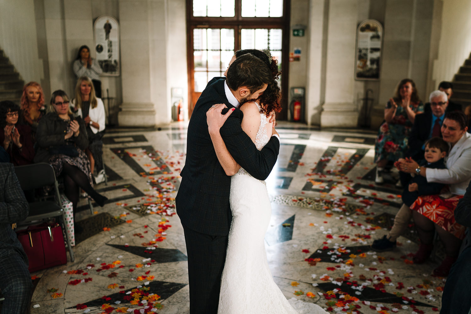 Bride and groom first kiss
