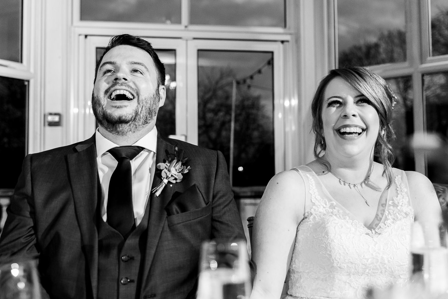 Bride and groom laughing