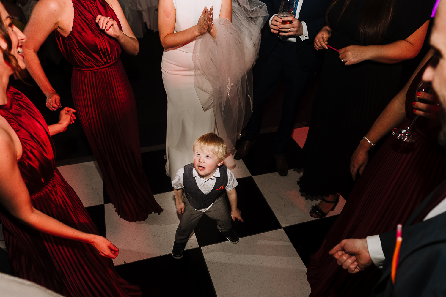 Little boy dancing on dance floor