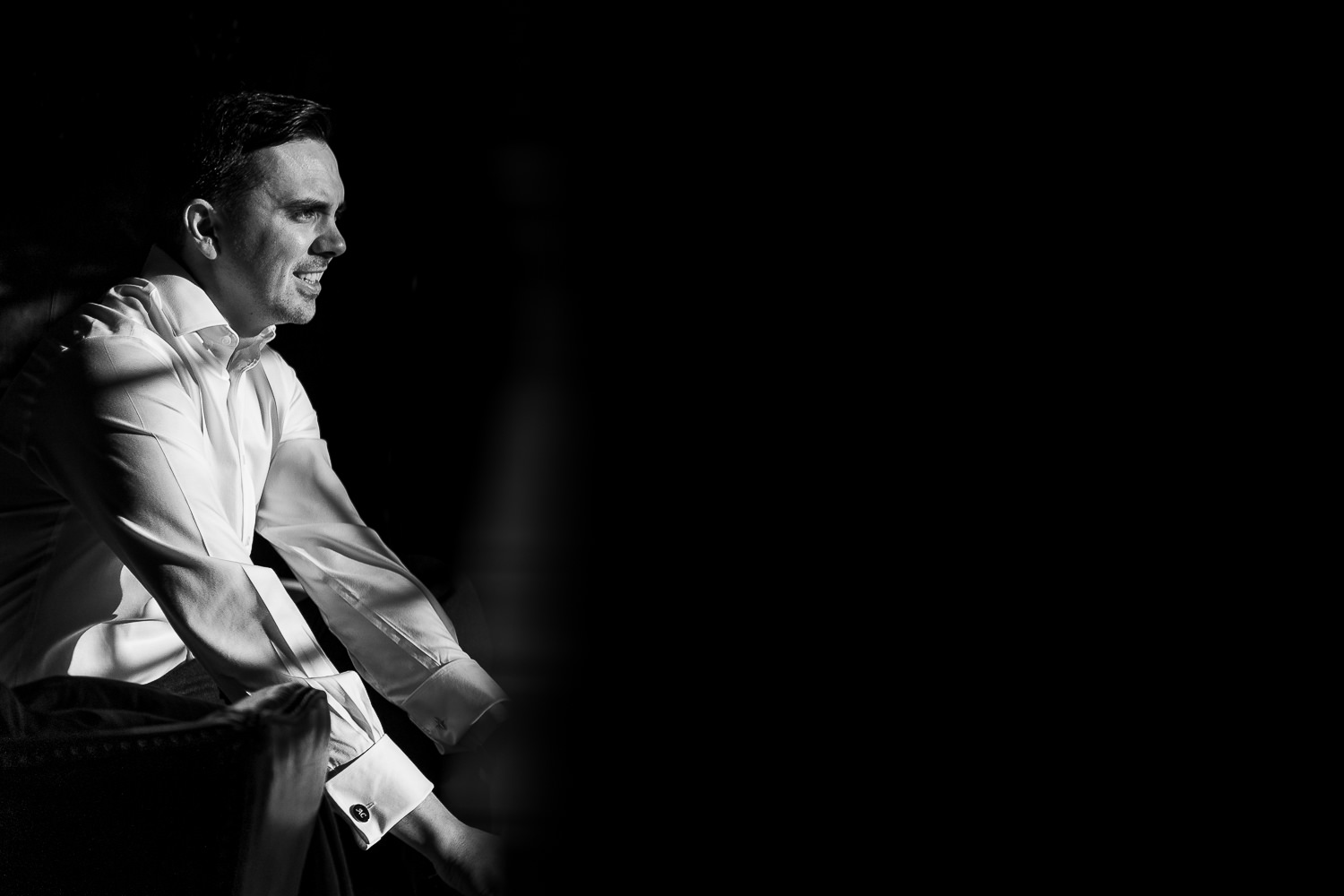 groomsmen getting ready in lgreat light at Eaves hall