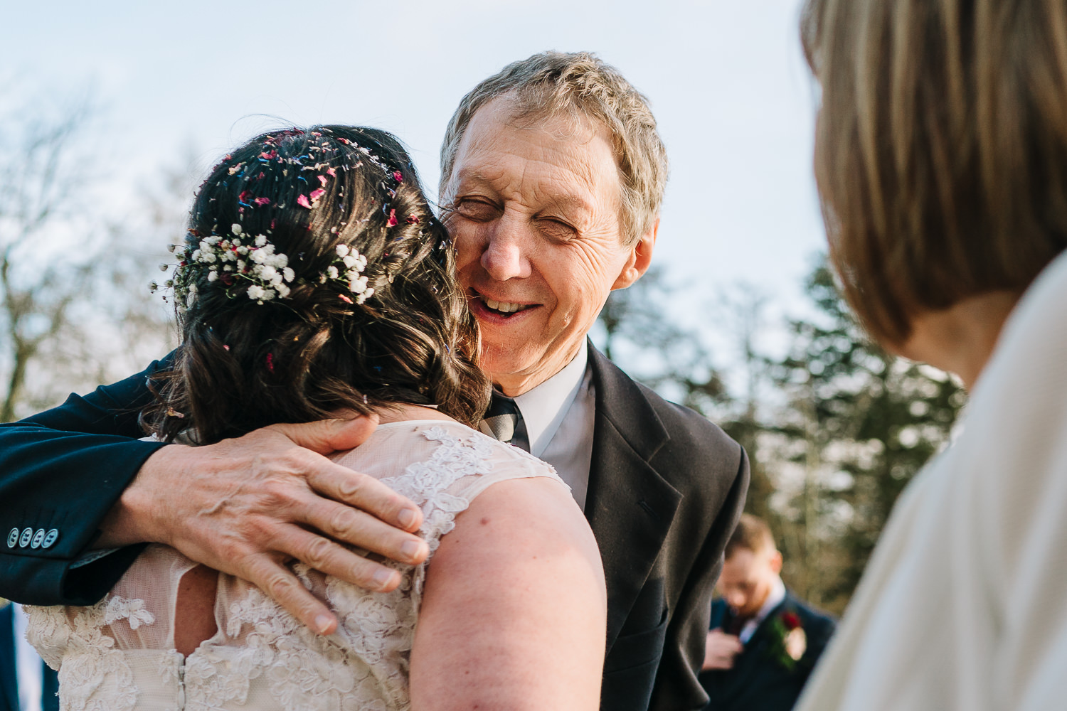 Bride hugging a guest