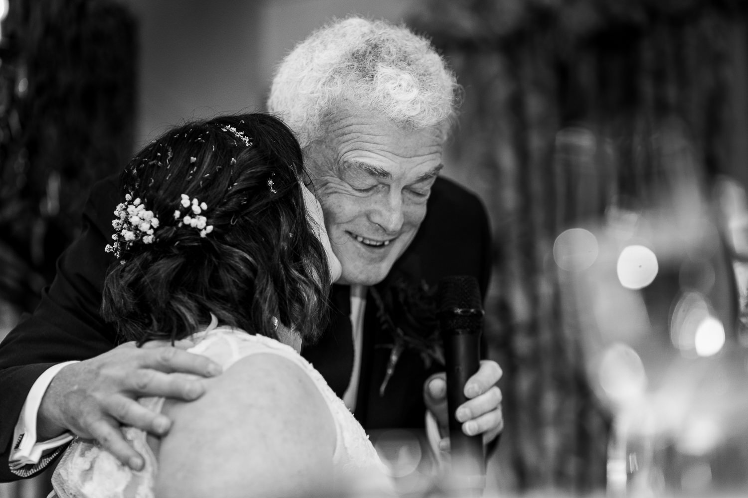 Bride hugging her dad at Eaves hall after the speech