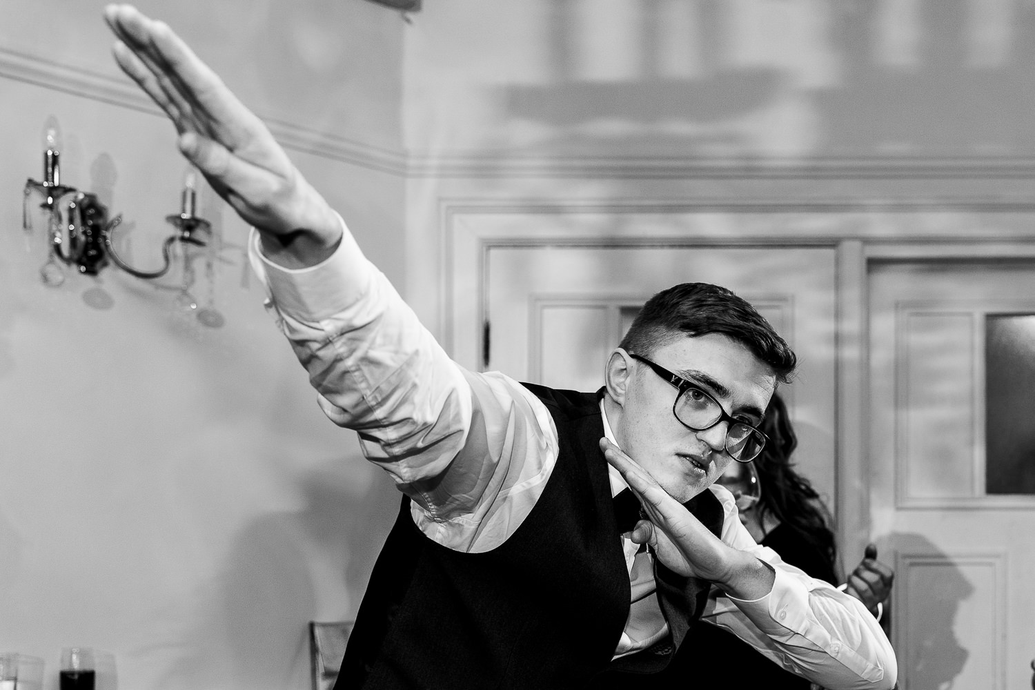 Guest dancing with hand in air