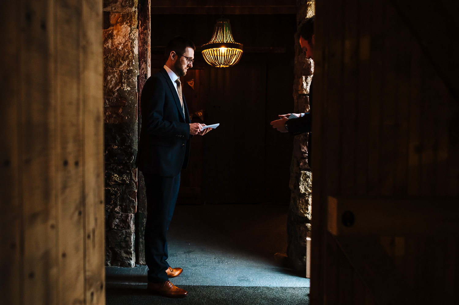 Groom reading his speech at the normans wedding venue