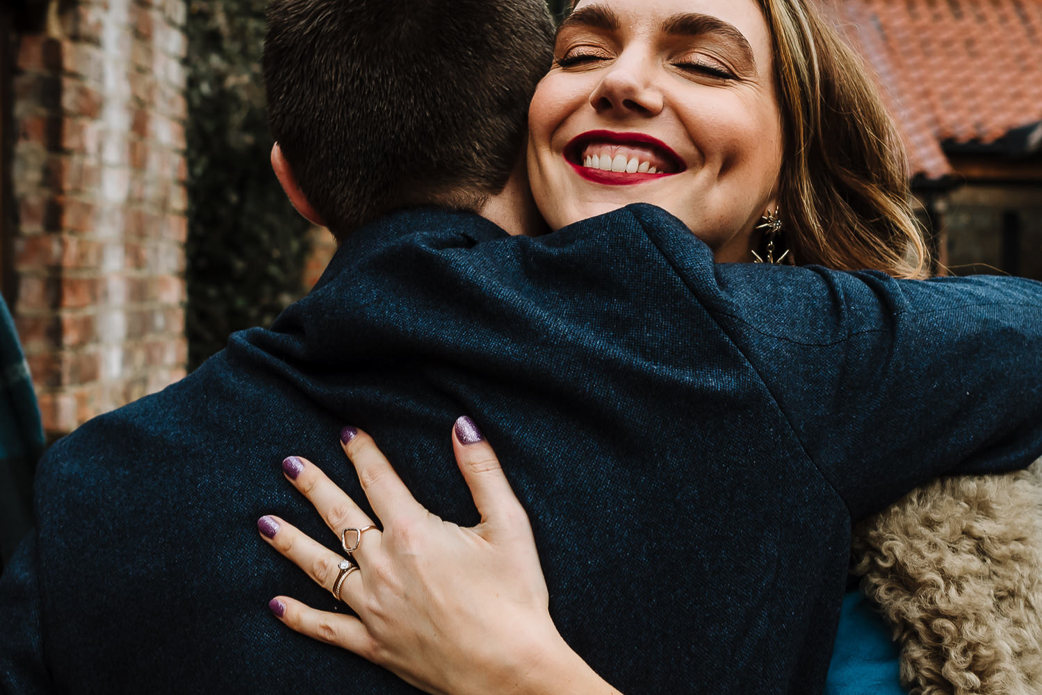 Female guest congratulating the groom