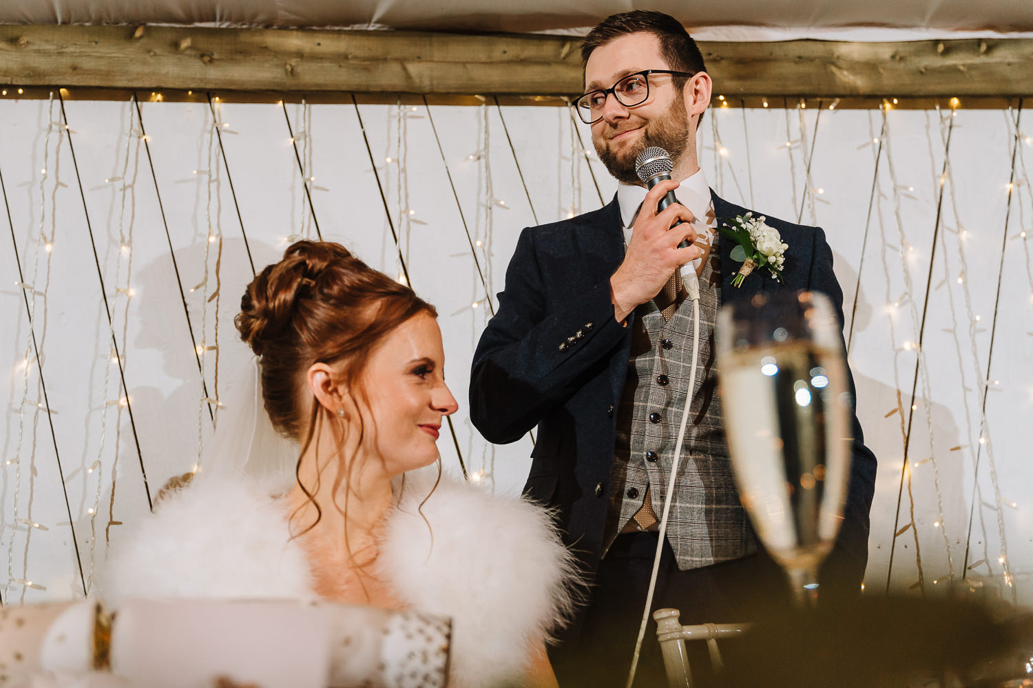 Grooms speech and bride laughing