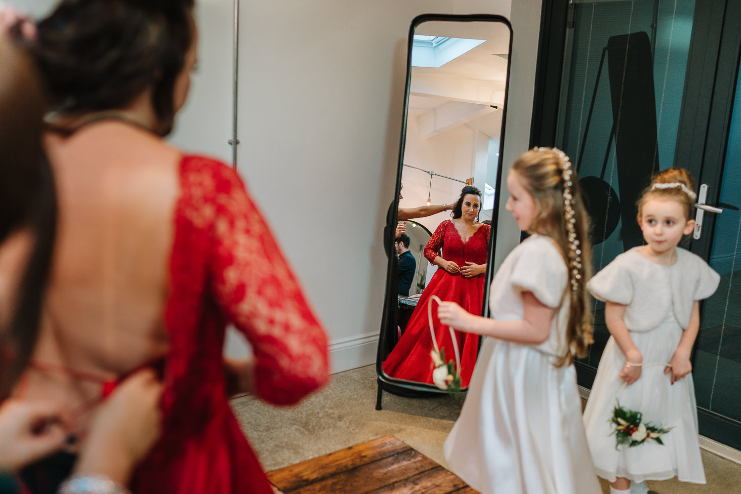Bride getting on her dress