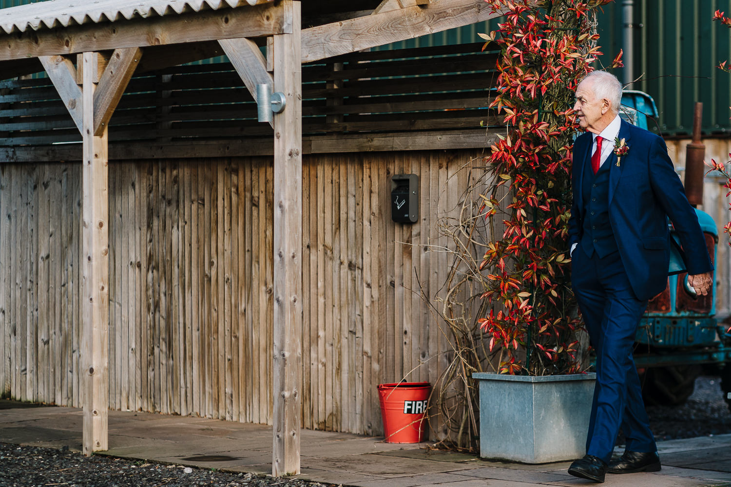 Father of the bride walking over to see the bride