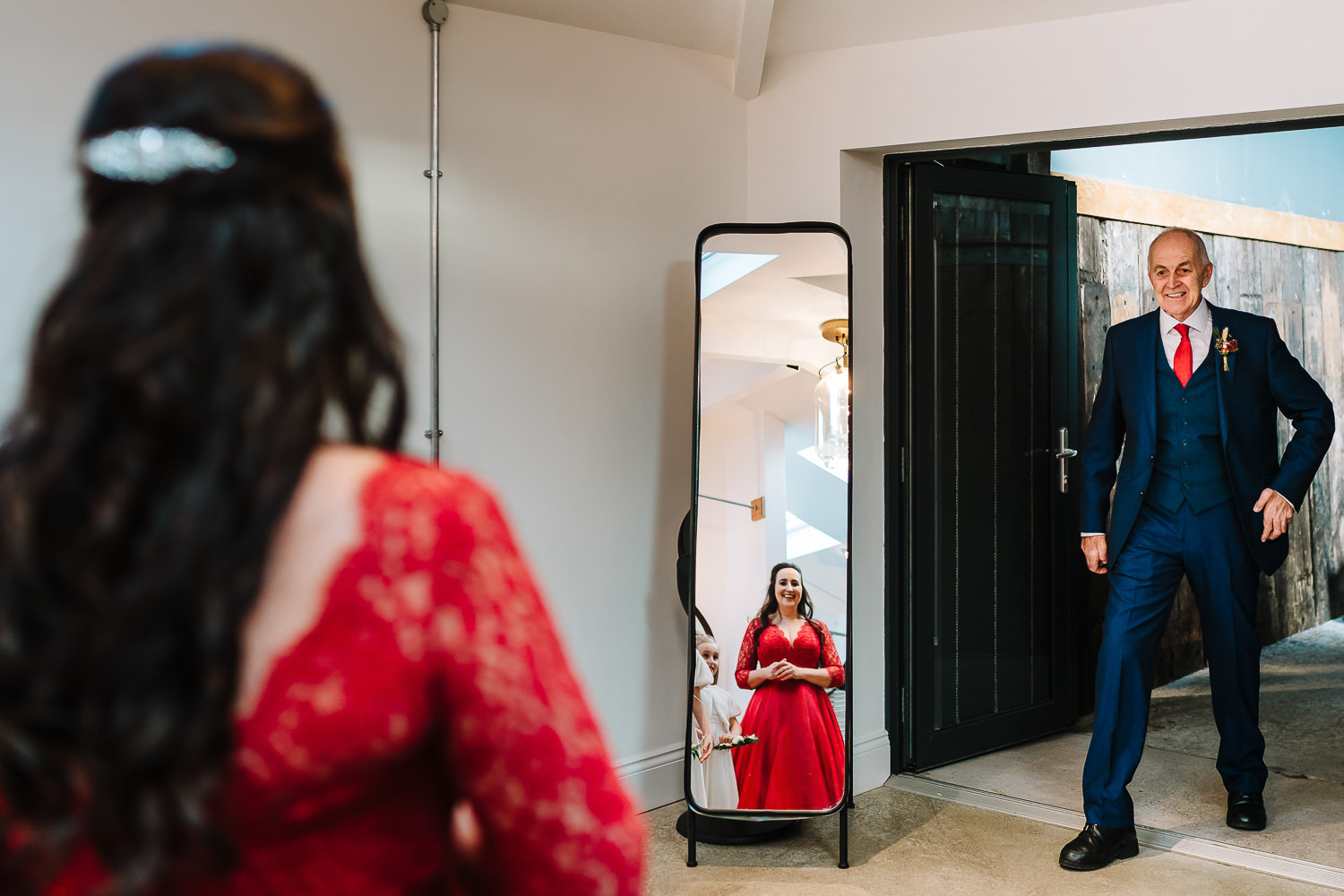 Father of the bride seeing the bride