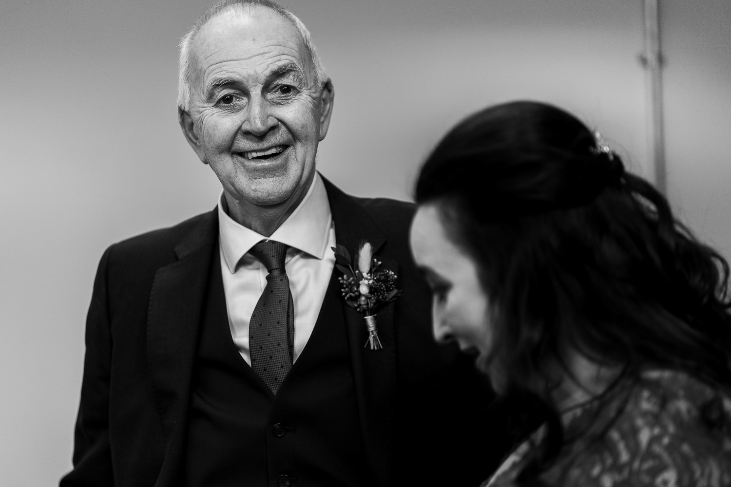 Father of the bride smiling