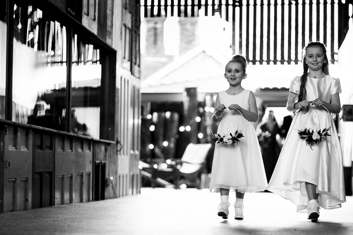 Flower girls walking to the ceremony