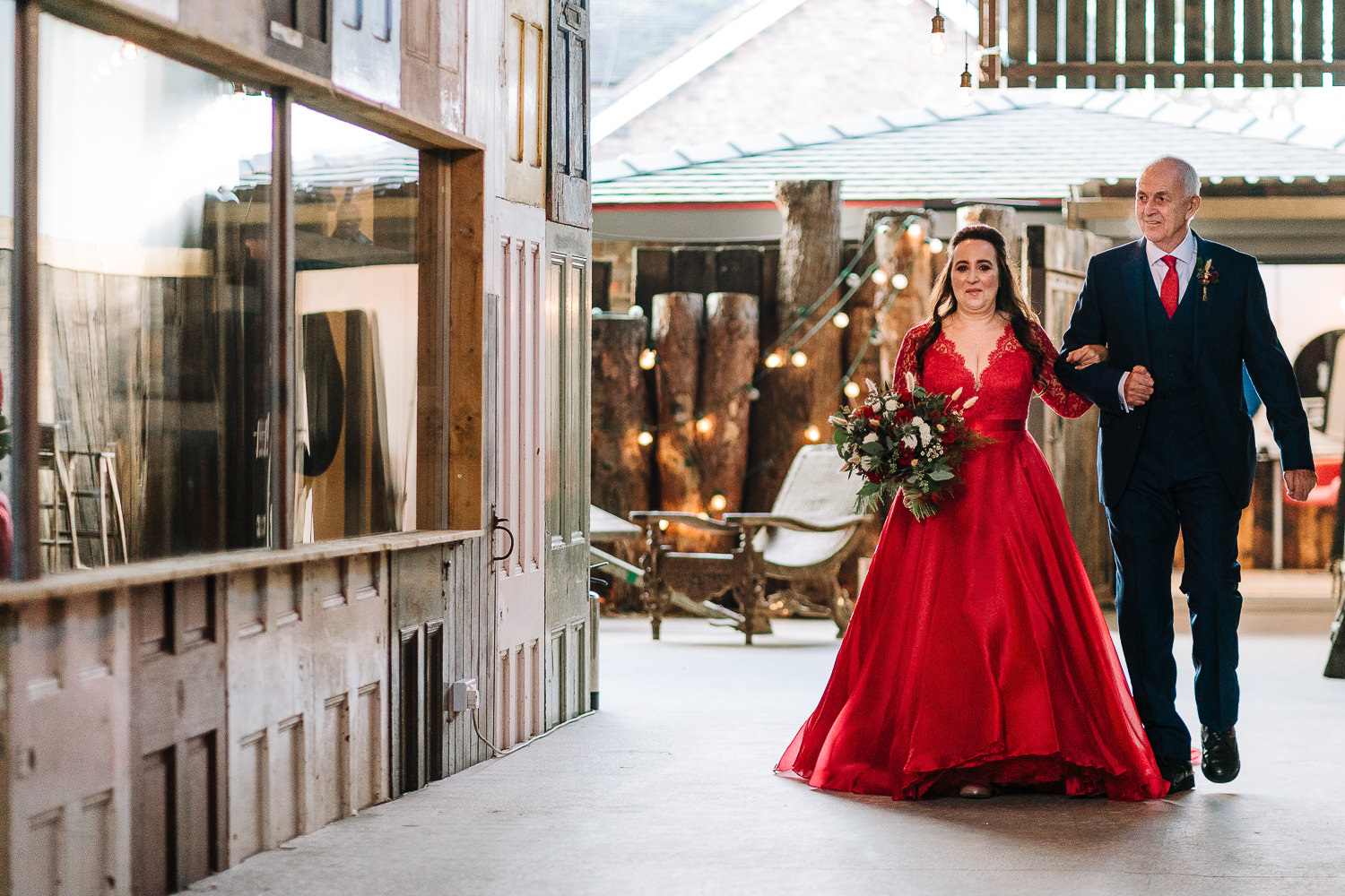 Father and bride walking to the service