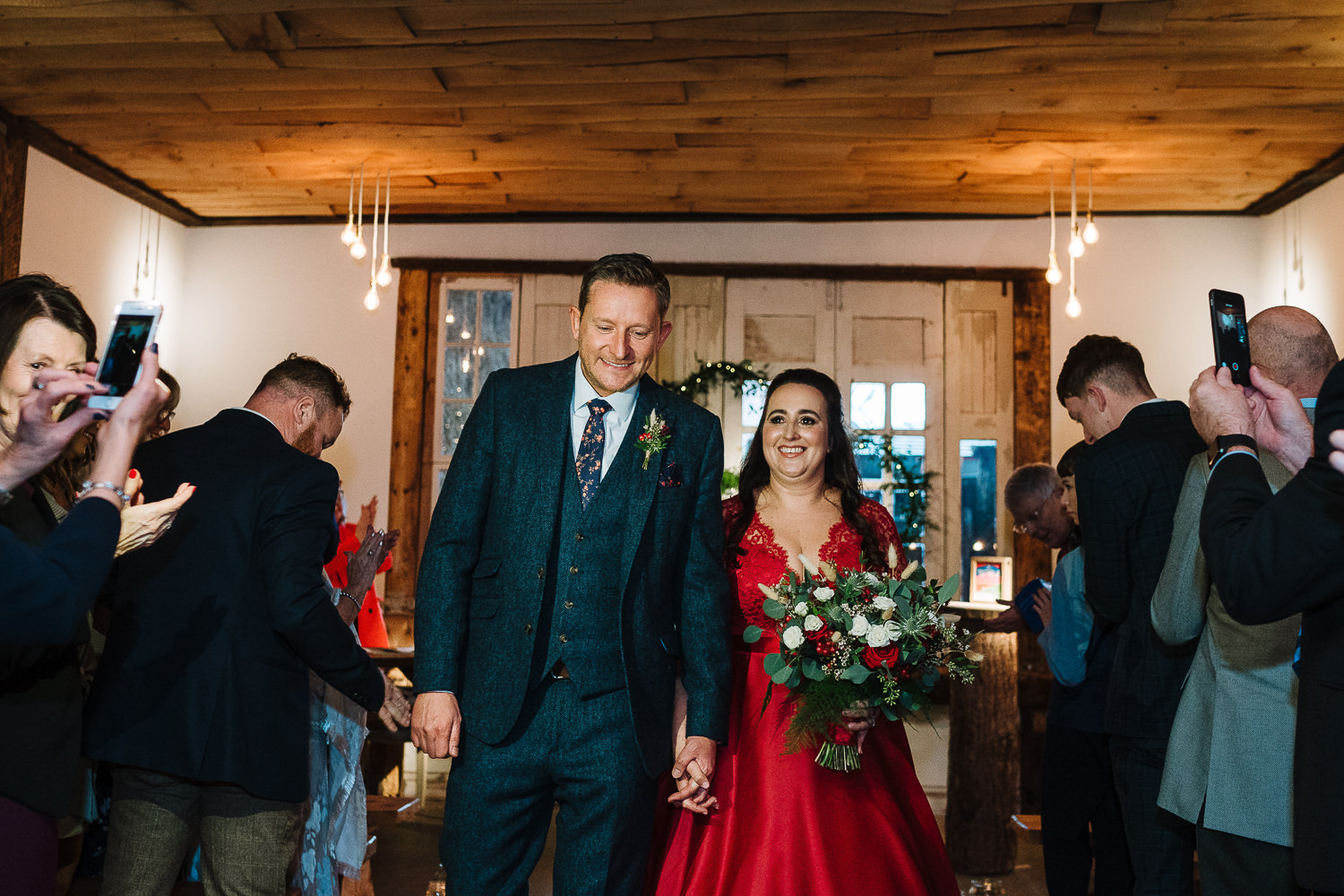 Bride and groom leaving the service